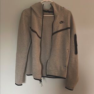 Dark grey with black trim Nike tech jacket, adult size small